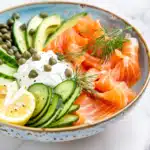 Smoked salmon keto breakfast bowl with cucumber and Greek yogurt - 242 calories, 26g protein