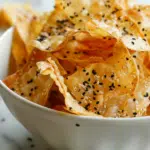 Golden crispy rice paper chips with everything bagel seasoning