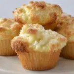 Cream cheese muffins soft and fluffy with a rich creamy center baked until golden