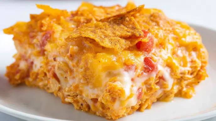 Dorito chicken casserole baked with shredded chicken, creamy sauce, and crunchy Doritos topping
