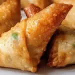 Rice paper samosas crispy golden pockets made with rice paper filled with spiced vegetables and fried until crunchy